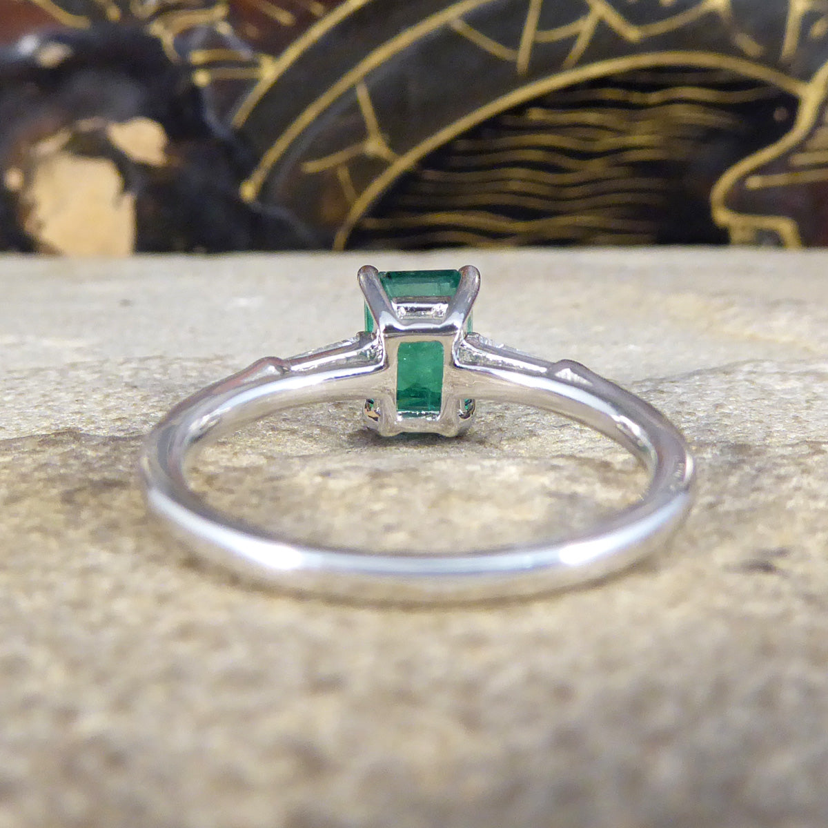 1.03ct Emerald Cut Emerald Ring with Tapered Baguette Cut Diamond Shoulders in Platinum - Wharfedale Antiques